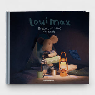 Maileg Book titled 'louimax Dreams of being an adult' with a mouse character under a blanket, holding a lantern and a cup.