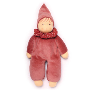 Stuffed toy resembling a gnome in a red outfit with a white background