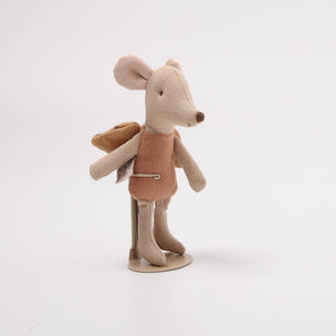 Stuffed toy mouse in a brown outfit on a white background