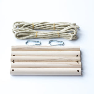 All the pieces to assemble a 5 rung Rope Ladder, showing the 2 pieces of 4 metre rope and clips to hang it. Sturdy Outdoor Wooden Toy | Conscious Craft