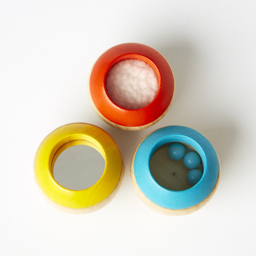 Sensory tumbling top plan toys