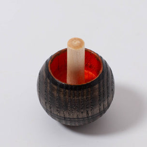 Turn over Spinning Top in grey with red | © Conscious Craft