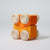 Grimm's Wooden toy car with orange body and beige wheels on a light gray background