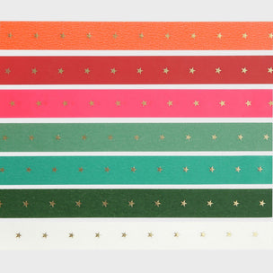 Set of colorful ribbons with star patterns on a white background