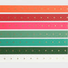 Set of colorful ribbons with star patterns on a white background