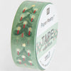Roll of decorative tape with Christmas tree and candle design on a white background