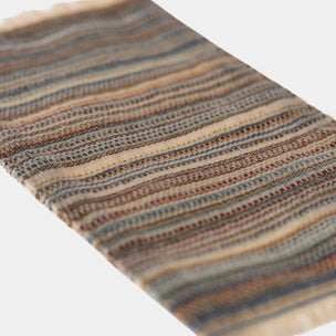 Striped maileg rug  with brown, blue, and beige colors on a white background