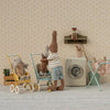 Maileg Miniature scene with toy figures in a laundry room setting.