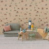 Children's room with patterned wallpaper, sofa, and toys.