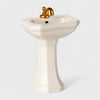 Maileg White pedestal sink with gold faucet on a light gray background