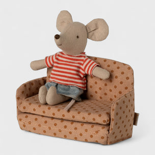 Maileg Toy mouse in a striped shirt sitting on a polka dot chair with a white background