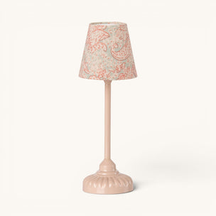 Small pink Maileg vintage lamp with a decorative lampshade on a white background