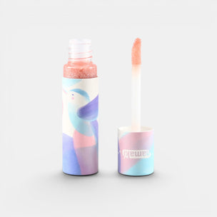 Two lip products with pastel gradient packaging on a white background