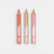 Three lip pencils with 'Naimaki' branding on a light gray background