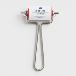 Metal roller with a label on a white background