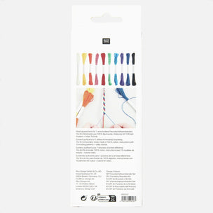 Packaged embroidery floss set in a white hanging card with a die-cut top, showing multiple color swatches of thread and small sample knots on a light gray background.