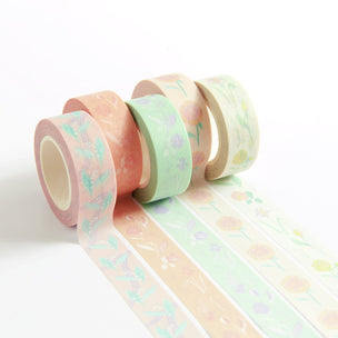 Set of pastel-colored washi tapes with floral patterns on a white background