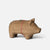A small Maileg wooden pig figurine or candle holder in a natural light brown finish, wrapped with a red and white striped string and featuring a small metal ring on top, set against a plain light gray background.