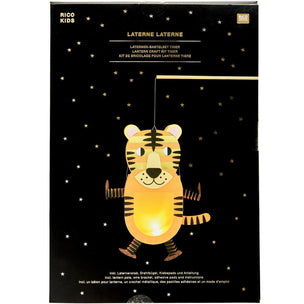 Rico Kids Laterne Laterne kit packaging box featuring a cute cartoon tiger hanging from a string against a black starry background.