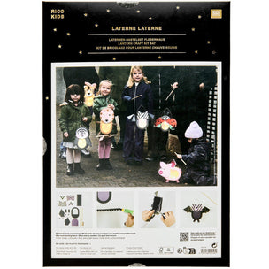 Rico Kids battery-free lantern craft kit in its original black packaging, featuring a central photo of children holding colorful lanterns and step-by-step assembly instructions at the bottom.