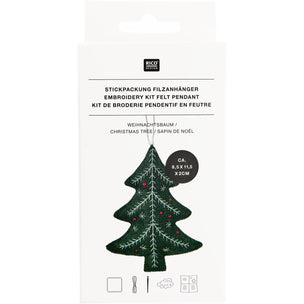 Rico Designs embroidery kit in its original white packaging, featuring a dark green Christmas tree design with white embroidery stitches and small red berry accents.