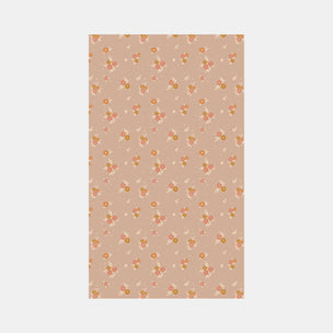 Floral patterned paper with small flowers on a beige background