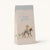Gift bag with a mouse riding a horse and 'happy birthday' text on a white background