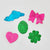 Five colorful decorative shapes made from foil  on a plain light background: a blue cloud, a pink bow, a green patterned egg, a pink heart, and a green four-leaf clover.