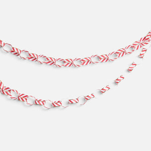 A festive red and white striped paper garland made of linked loops, draped in two curved rows against a plain light gray background.