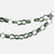 A green and gold chain-link paper garland with alternating dark green bands and textured gold-patterned loops, displayed on a clean white background.