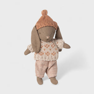 Maileg rabbit toy wearing a knitted sweater and hat on a white background