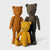 Maileg Three teddy bears in different colors standing together on a white background