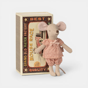 Stuffed Maileg mouse toy in a dress standing next to a matchbox with 'Best Mouse Race' text.
