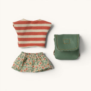 Set of small  Maileg mouse clothing items including a striped shirt, floral skirt, and green pouch on a white background
