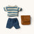 Set of miniature Maileg Mouse clothing items including a striped sweater, pants, and a brown bag on a white background