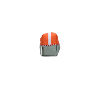 Small rectangular object with orange top and gray bottom on a white background