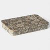 Floral-patterned tin box on a white background