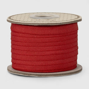 Maileg Spool of red ribbon  on a white background