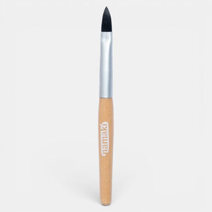 Makeup brush with wooden handle and silver ferrule on a white background