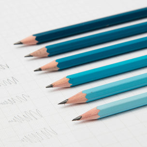 Blue pencils on a white background