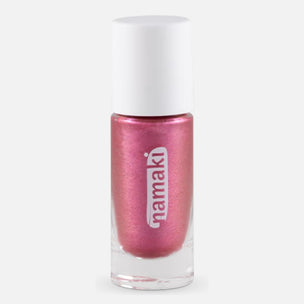 A bottle of Namaki metallic pink body gel with a white cap, shown against a light gray background.