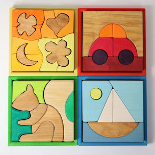 Grimm's Set of wooden puzzles with colorful borders on a white background