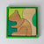 Grimm's Wooden squirrel puzzle in a green box on a white background