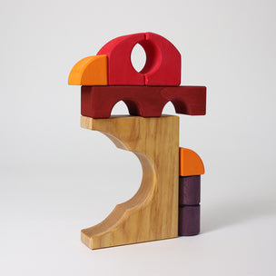 Colorful wooden toy blocks on a white background