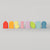 Grimm's Set of colorful, abstract wooden blocks on a light gray background