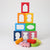 Grmm's Colorful wooden blocks with cut-out shapes stacked on a white background.