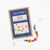 Rainbow beaded bracelet with packaging labeled 'Cotton Twist' on a white background