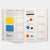 Open book showing pages with color experiments and mark-making exercises on a white background