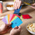 people holding up cards