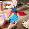 people holding up cards